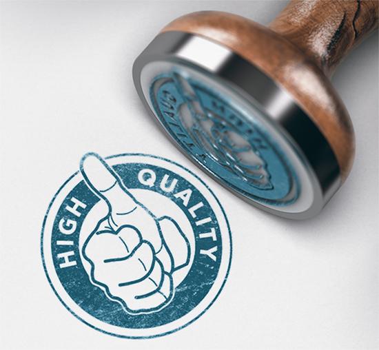 close-up of thumbs up stamp that says high quality