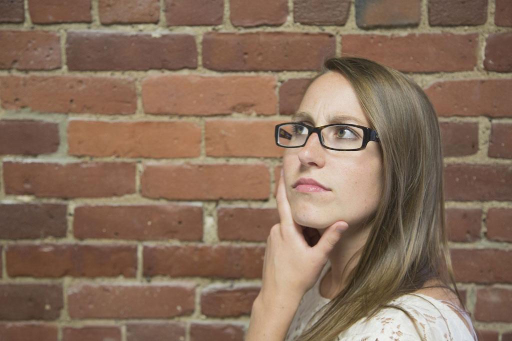 woman looking off thoughtfully